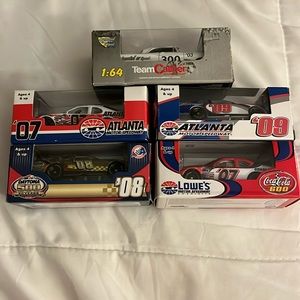 Five 1:64 race cars